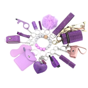 15-piece purple rhinestone self-defense keychain set with alarm and accessories