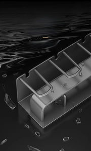 Detail of space aluminum toothbrush holder with brushed matte finish in gunmetal grey