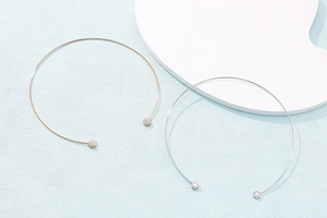 Minimalist gold and silver open choker necklaces with sparkling rhinestone ends detail
