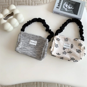 Vintage textured canvas tote bags with pleated handles and butterfly embroidery patterns