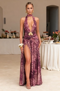 Detail of fuchsia leopard print gown featuring deep V-neck and golden flower waist decor