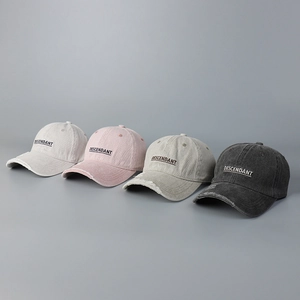 Detailed embroidery of Descendant text on distressed vintage wash cotton baseball caps