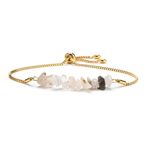 Detail of adjustable gold slider bracelet with natural crystal crushed stone beads