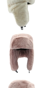 Detail view of winter faux rabbit fur trapper hat with ear flaps and buckle closure