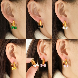 French style gold bow earrings with colorful zircon stones shown in multiple views