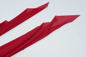 Detail view of red double-layered mesh fabric straps for the slimming bodycon dress set