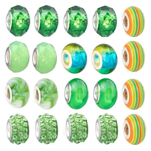 Macro detail of 20 green series faceted glass beads with silver metal cores for DIY jewelry