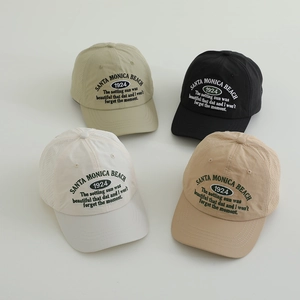 Kids vintage baseball caps in black, cream, and khaki with Santa Monica Beach embroidery