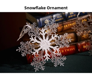 Detailed macro shot of a transparent acrylic snowflake ornament on vintage books
