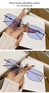 Detail of silver metal square sunglasses featuring translucent blue lenses and angular temples