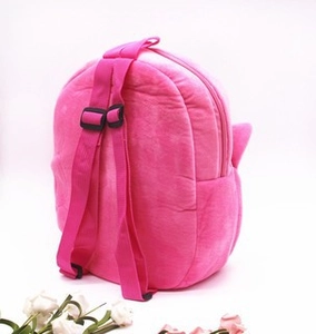 Detailed back view of plush unicorn backpack with adjustable straps and zipper closure