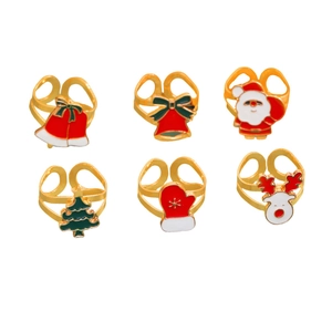 Flat lay view of 6-piece adjustable Christmas rings set with colorful enamel icons