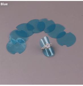Blue car door handle scratch protector film set of 8 pieces shown with ring for scale