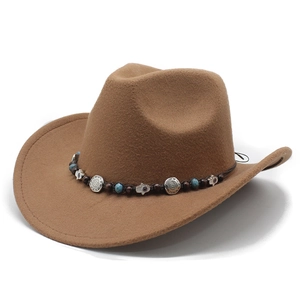 Brown western cowboy felt hat with ethnic beaded band and turquoise pendants