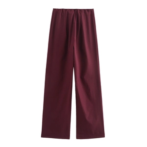 Elegant burgundy wide-leg trousers with elastic waist and stylish pleats for a chic look