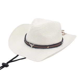 Handwoven white raffia cowboy hat featuring brown leather band and metal bull head ornament