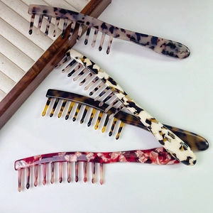 Retro acetate wide-tooth hair combs in various tortoiseshell patterns for curly hair styling