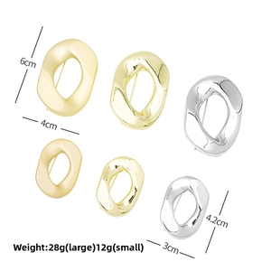 Irregular geometric metal brooches in shiny gold and silver finishes showing various sizes