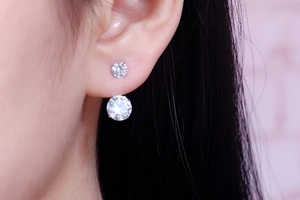 Close-up of S925 silver double zircon earrings worn with elegant dual-wear crystal design