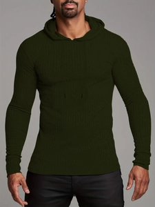 Close-up of dark green ribbed knit texture on a men's slim fit athletic hoodie