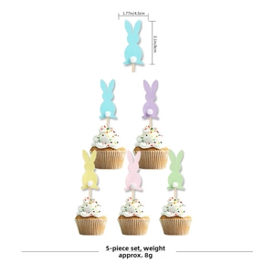 Detailed view of pastel bunny cupcake toppers with wooden picks and soft pompom tails
