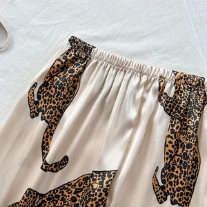 Women's leopard print satin pajama set featuring elastic waist long pants in silky fabric