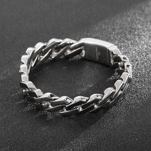 Close-up of silver 316L stainless steel Cuban link bracelet with 316L engraving