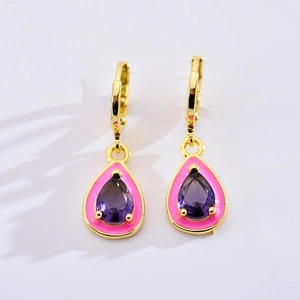 Detailed close-up of water drop earrings with purple gems and pink enamel in gold plating