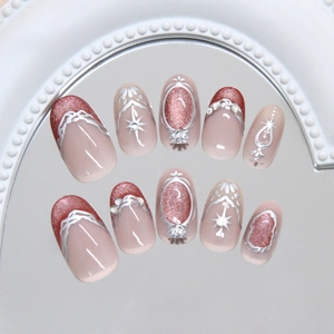 French cat-eye press-on nails with silver glitter stars on a reflective mirror base