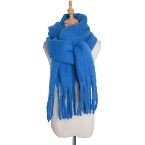 Detailed close-up of Royal Blue mohair scarf with fringe tassels on a mannequin display