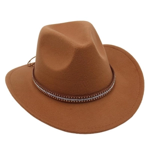 Top view of brown felt cowboy hat with leather band featuring rhinestones and studs