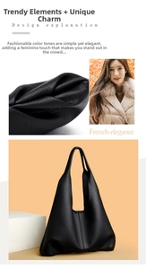 Detail of black pebbled leather tote bag showing high-quality texture and minimalist design