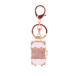 Elegant rhinestone-studded suitcase keychain in white and gold for women handbag accessory