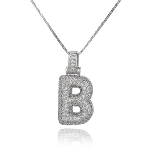 Macro detail of silver letter B pendant with micro-paved zircons and a classic box chain