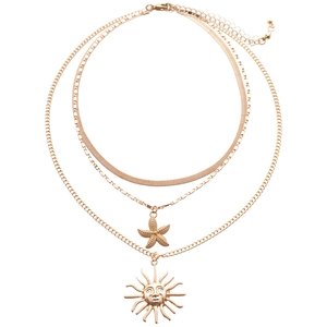 Three-layer gold layered necklace with starfish and sun pendants in bohemian style