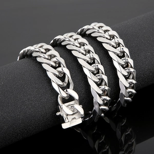 Polished silver 16mm Cuban link chain necklace with secure clasp on a sleek black stand