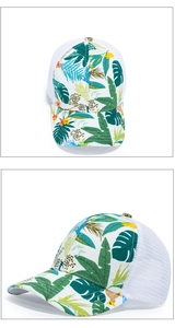 Detail of tropical plant print on baseball cap with breathable white mesh backing