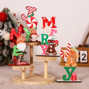 Christmas wooden gnome and gingerbread man tabletop ornaments displayed on wooden shelf