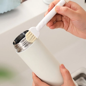 Multi-functional cleaning brush for vacuum flask lid gaps with white plastic handle