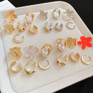 Set of 6 textured floral open rings and ear cuffs in gold and silver finish