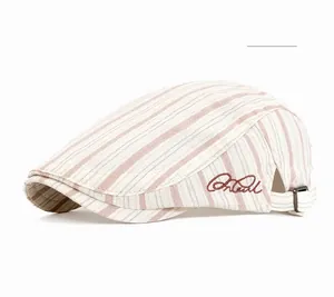 Detail of red striped newsboy cap with embroidery and adjustable metal buckle back