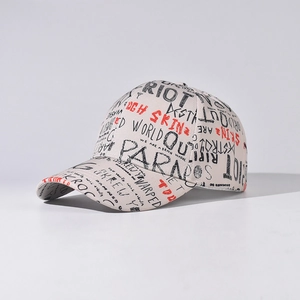 Detail of off-white baseball cap featuring bold black and red street graffiti prints