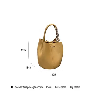 Khaki pebbled leather bucket bag with scarf-wrapped handle and adjustable strap