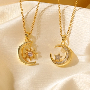 Elegant gold celestial necklace set featuring moon, sun and star pendants with zircons