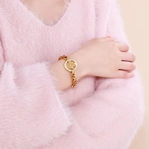 Gold stainless steel Hamsa Hand bracelet with iced-out pave set rhinestones for women