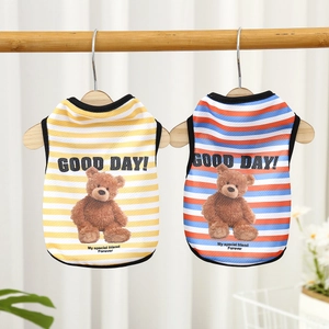 Close-up of breathable mesh pet vests with cute bear prints and colorful stripes
