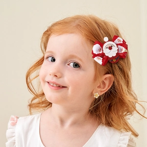 Barrette de Noël avec nœud rouge et blanc et figurine de Père Noël pour filles