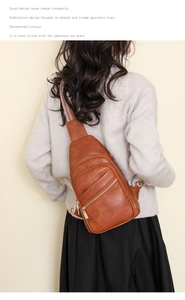 Brown vintage leather chest bag for women with multi-zipper and jacquard strap