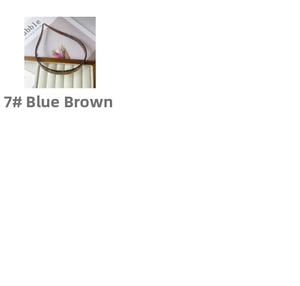 Close-up of slim acetate headband in blue-brown tortoiseshell pattern for women