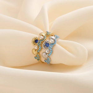 Elegant shell-shaped S925 silver rings with blue gemstones and freshwater pearls